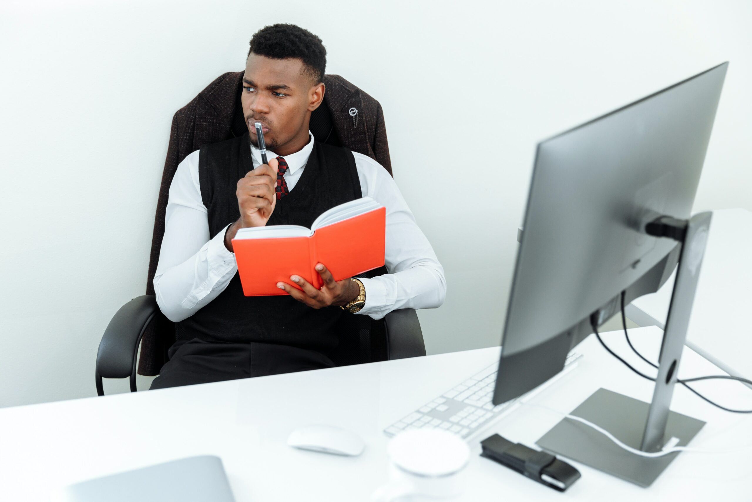 Office man thinking what to write